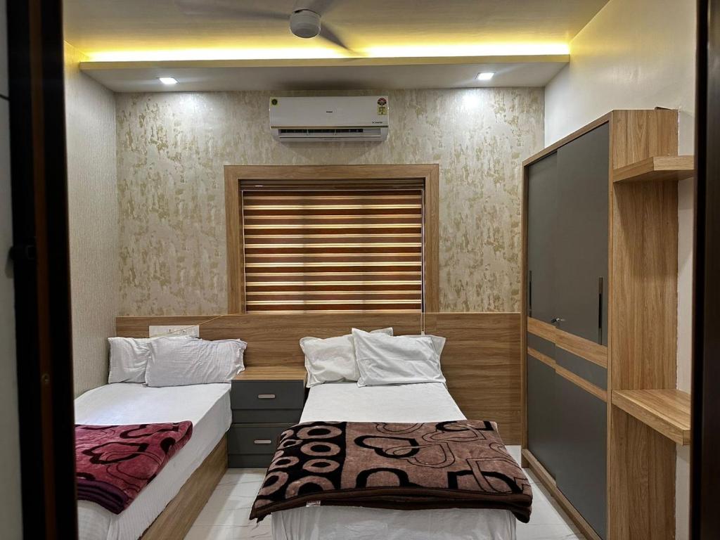 Postel nebo postele na pokoji v ubytování MEDURE International