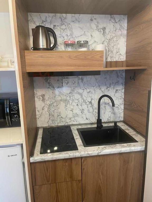 Kuchyň nebo kuchyňský kout v ubytování new gudauri redko apartment twins