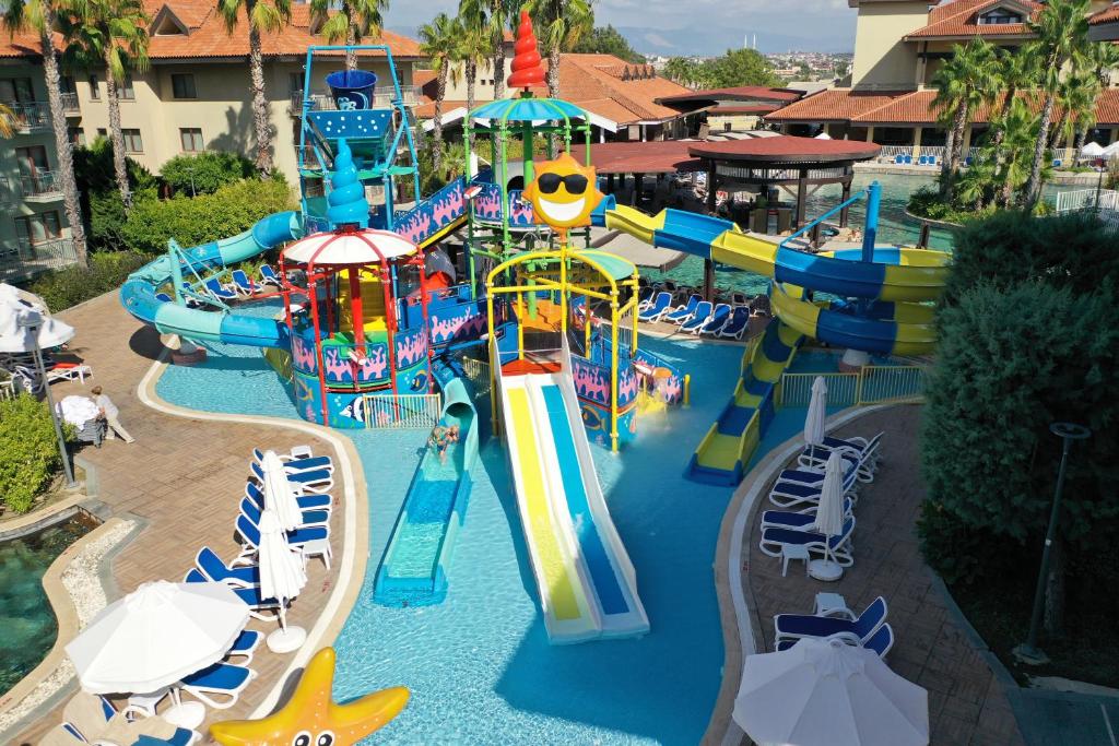 an image of a water park with a water slide at CLUB GRAND AQUA in Side