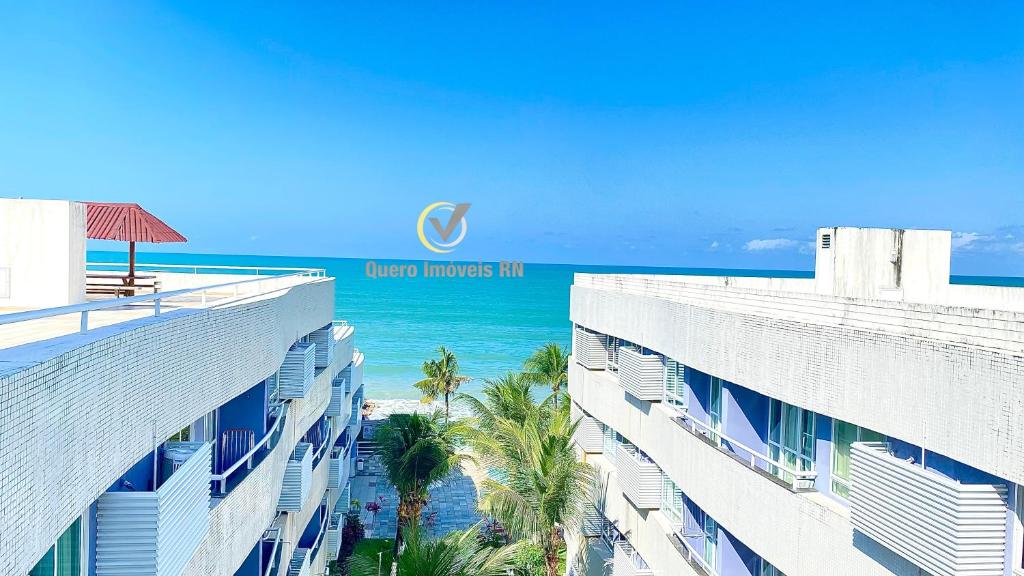 a view of the ocean from the balcony of a hotel at Ponta Negra Beach beira-mar in Natal