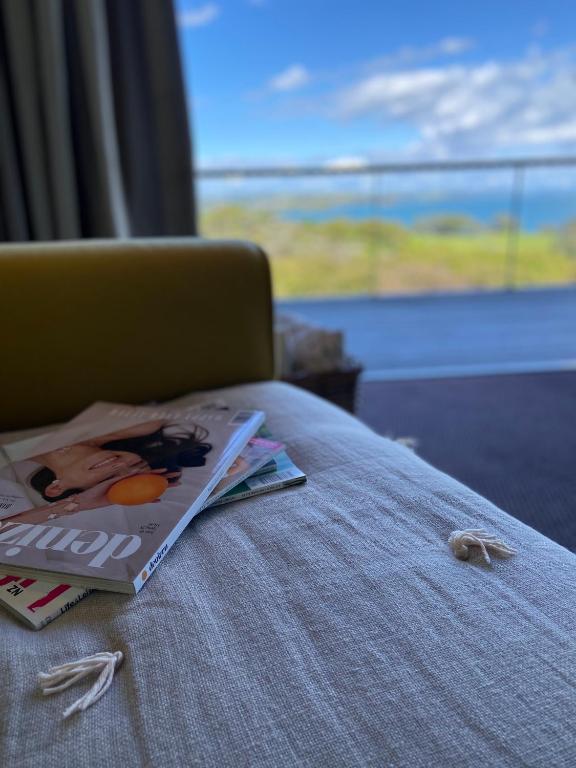 Postel nebo postele na pokoji v ubytování La Bodega Waiheke Island