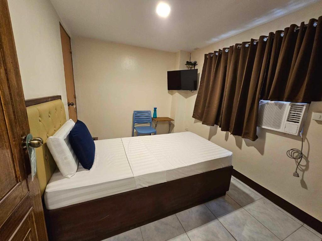 Postel nebo postele na pokoji v ubytování Suntal Residences