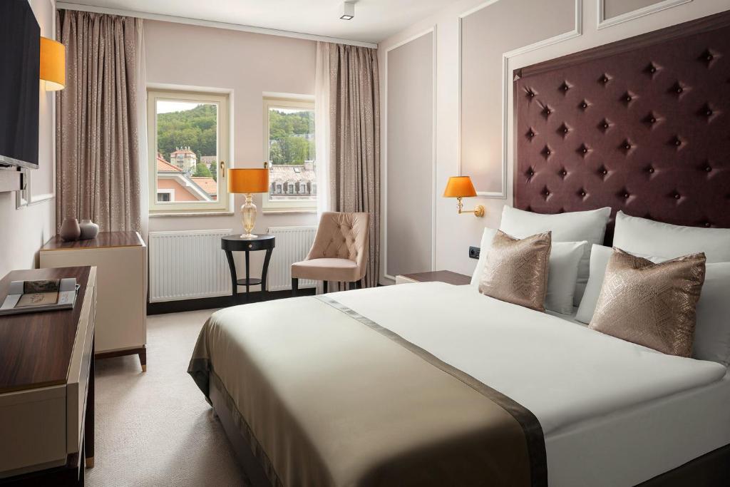Postel nebo postele na pokoji v ubytování Boutique Hotel Saxonia