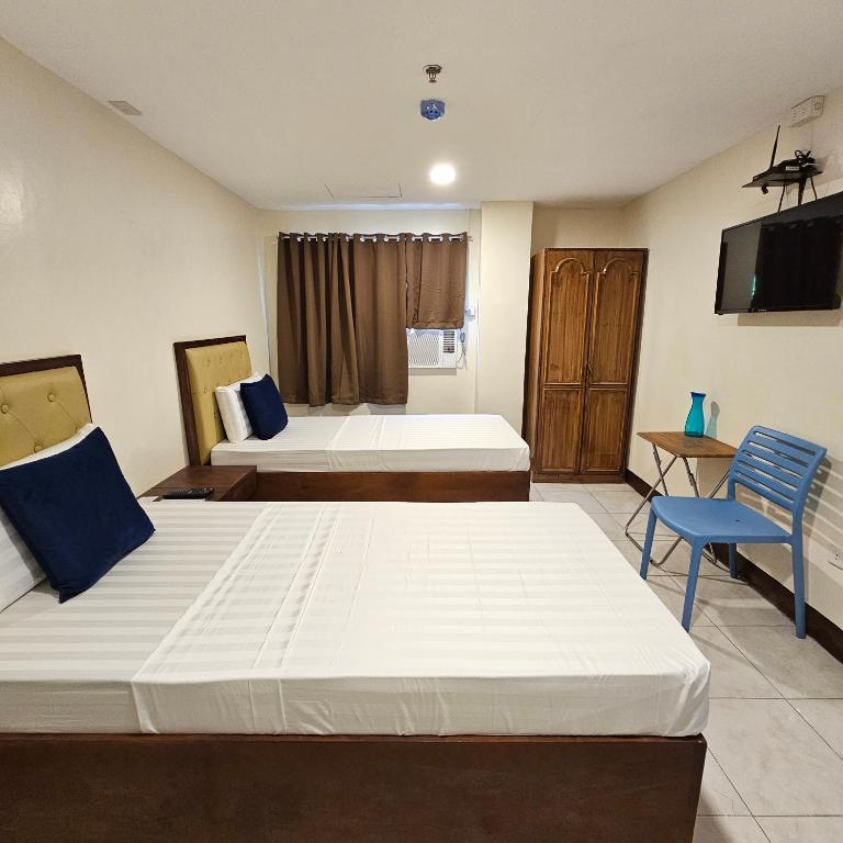 Postel nebo postele na pokoji v ubytování Suntal Residences