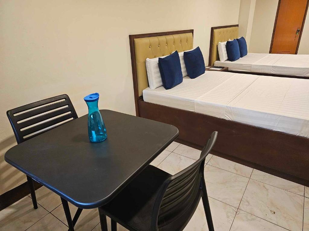 Postel nebo postele na pokoji v ubytování Suntal Residences