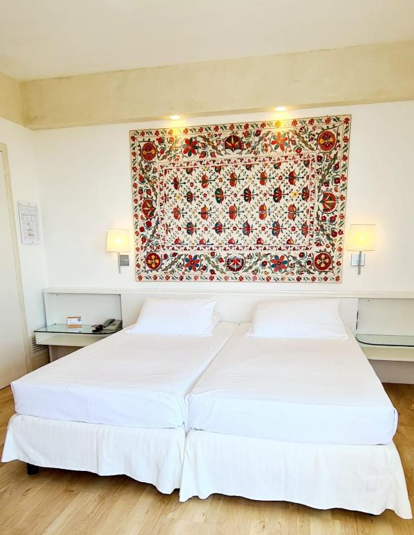 Letto o letti in una camera di Art&Park Hotel Union Lido