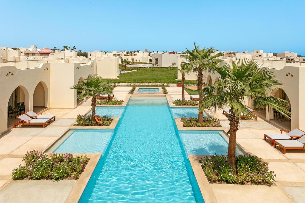 an image of a swimming pool at a resort at Xanadu Makadi Bay - High Class All Inclusive in Hurghada