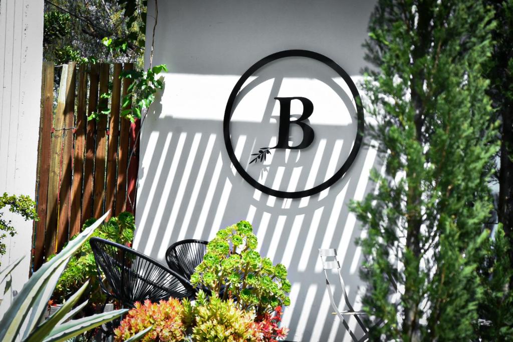 a letter b sign on the side of a house at Beautiful Betty B&B in Beaufort West