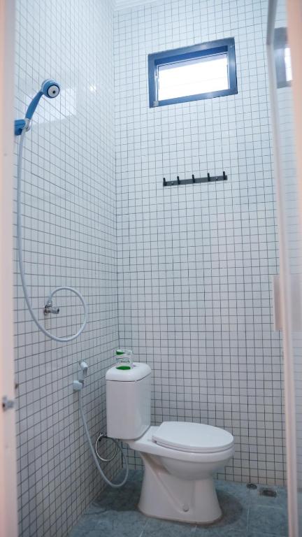 Koupelna v ubytování Wangi Homestay