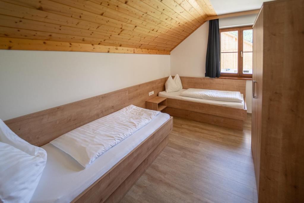 Postel nebo postele na pokoji v ubytování Landhotel - Apartments Bauer