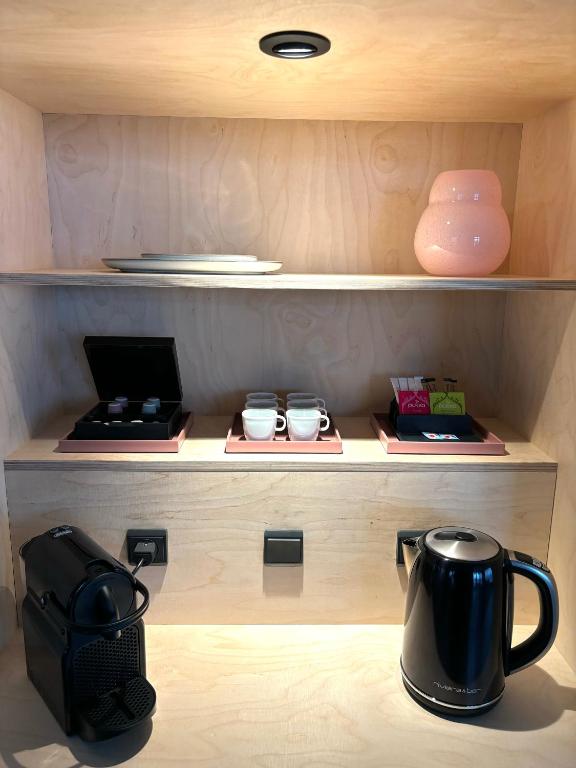 Comodidades para chá e café em CPH Hotel