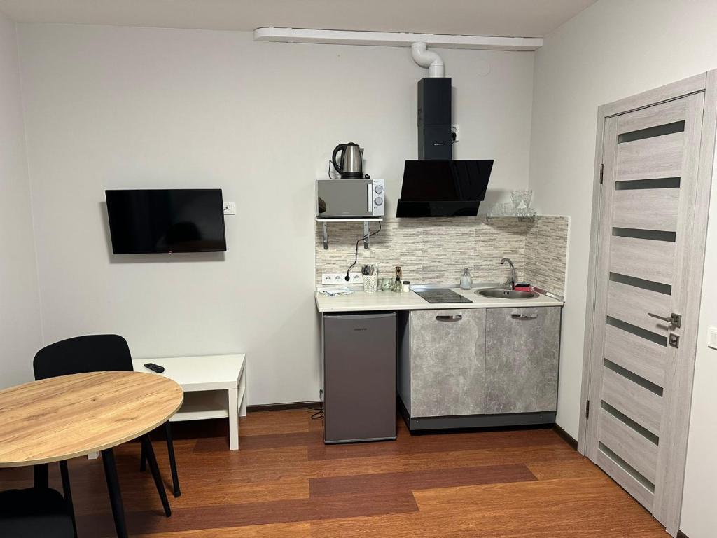 Kuchyň nebo kuchyňský kout v ubytování Modern Apartments Uzhgorod