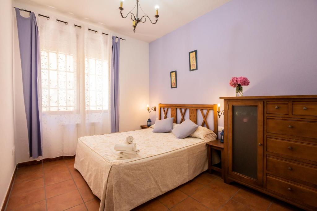 Postel nebo postele na pokoji v ubytování Casa rural las Eras