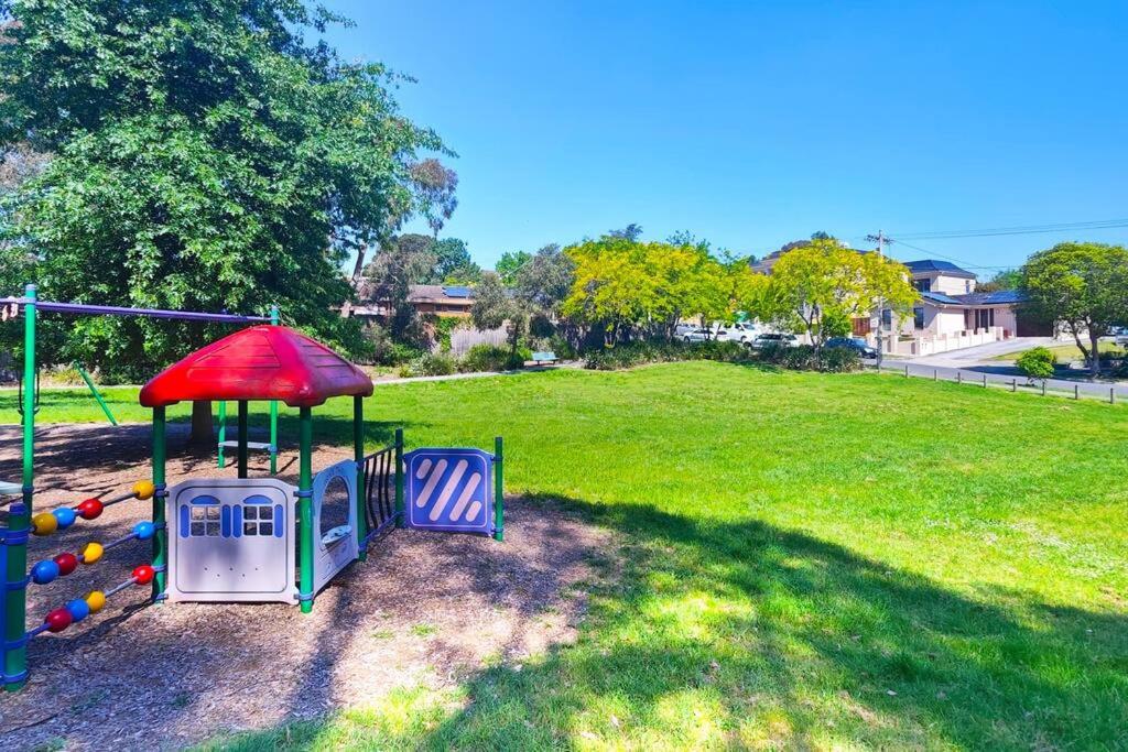 a playground in a park with a play equipment at Mel Eastern Villa near everything in Doncaster East