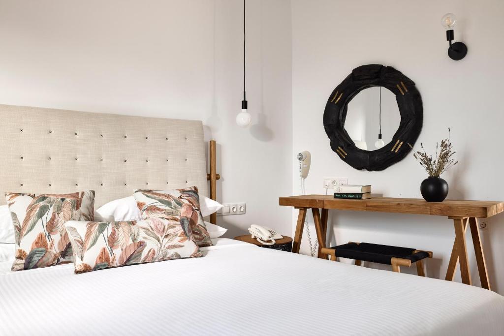 Postel nebo postele na pokoji v ubytování Glavas Inn Hotel