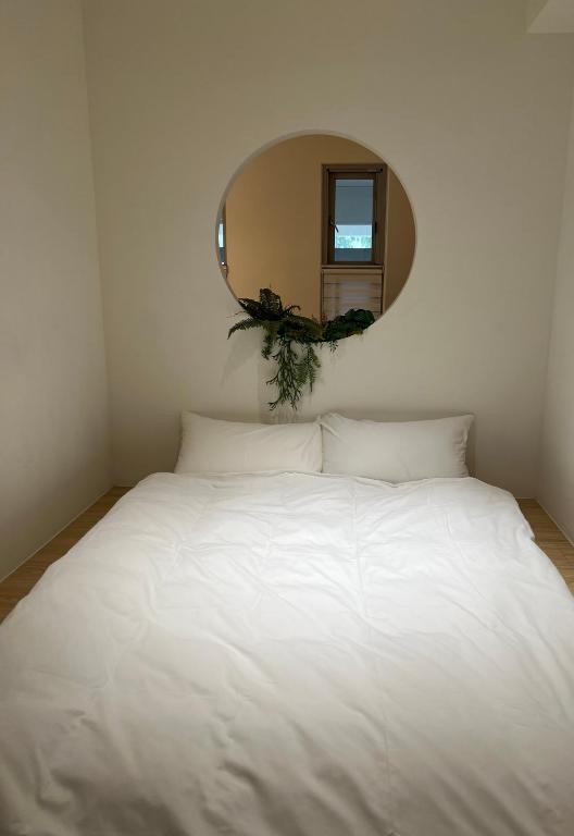 Voodi või voodid majutusasutuse Yama no Shita Homestay toas