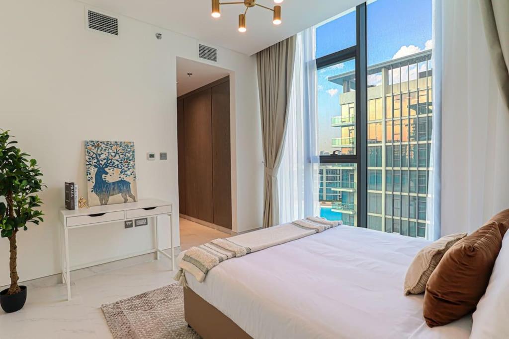 Fotografie z fotogalerie ubytování HiGuests - Magnificent Apartment with Stunning Lagoon Views v Dubaji
