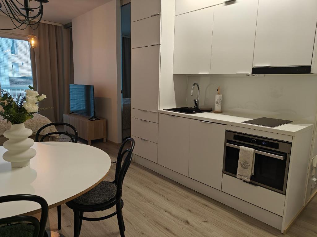Kuchyň nebo kuchyňský kout v ubytování Lapland Arctic Apartments