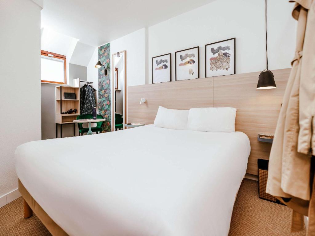 Postel nebo postele na pokoji v ubytování ibis Styles Luxembourg Centre Gare