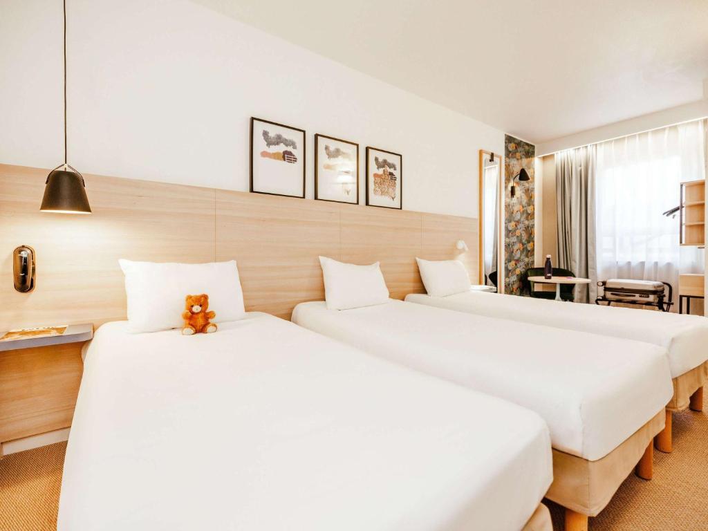 Postel nebo postele na pokoji v ubytování ibis Styles Luxembourg Centre Gare