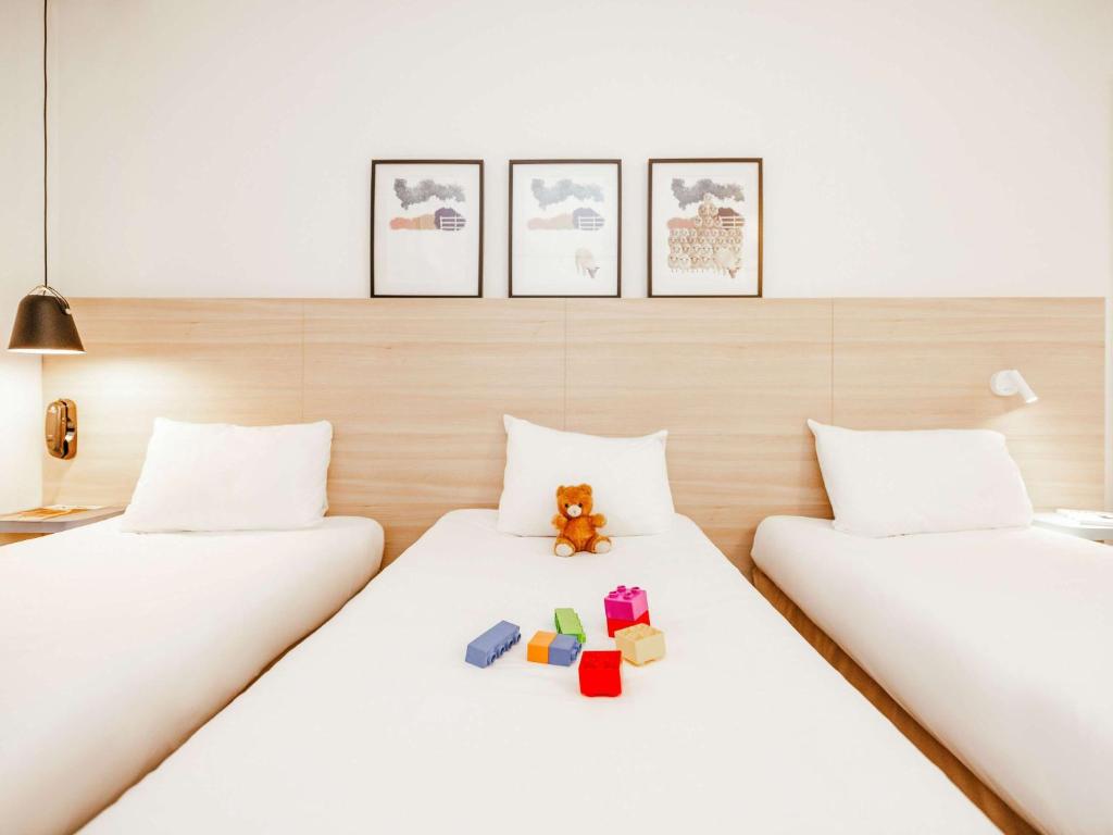 Postel nebo postele na pokoji v ubytování ibis Styles Luxembourg Centre Gare