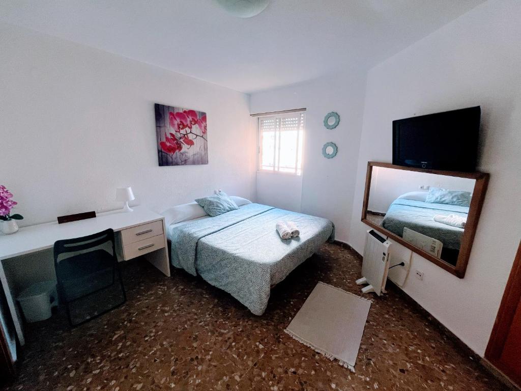 Postel nebo postele na pokoji v ubytování Confort y relax centro
