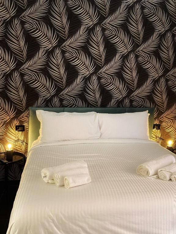 Postel nebo postele na pokoji v ubytování Le Colonne B&b