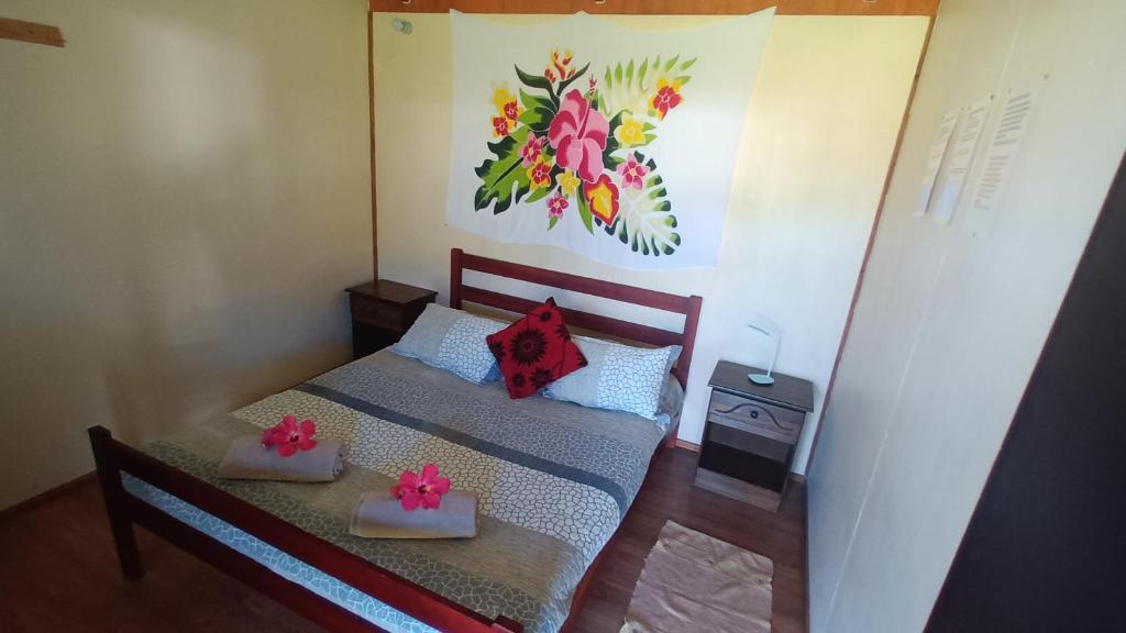 Letto o letti in una camera di Camping Hostal Tipanie Moana Aeropuerto Centro