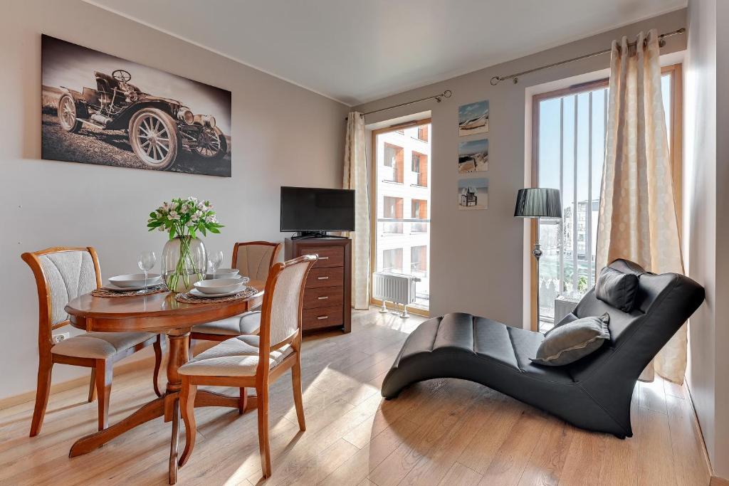Posedenie v ubytovaní Flatbook - City Center SPA Apartments Motlawa