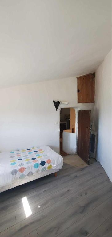 Postel nebo postele na pokoji v ubytování Maison avec vue panoramique