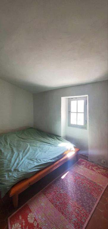 Postel nebo postele na pokoji v ubytování Maison avec vue panoramique