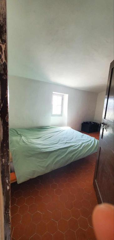 Postel nebo postele na pokoji v ubytování Maison avec vue panoramique