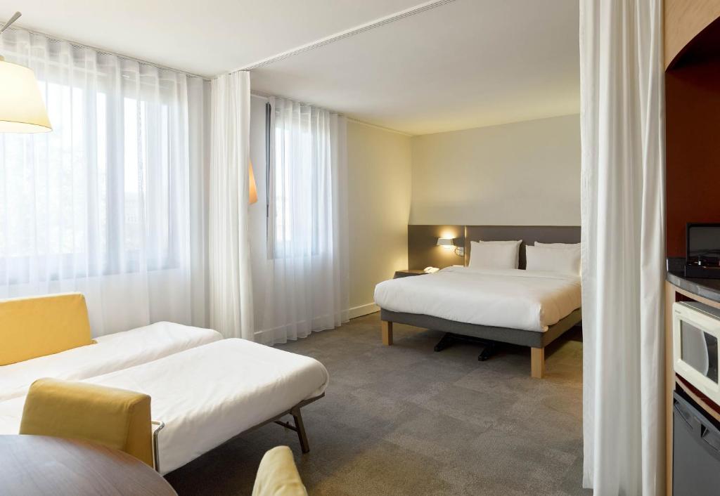 Un ou plusieurs lits dans un hébergement de l'établissement B&B HOTEL Paris Nord 18ème