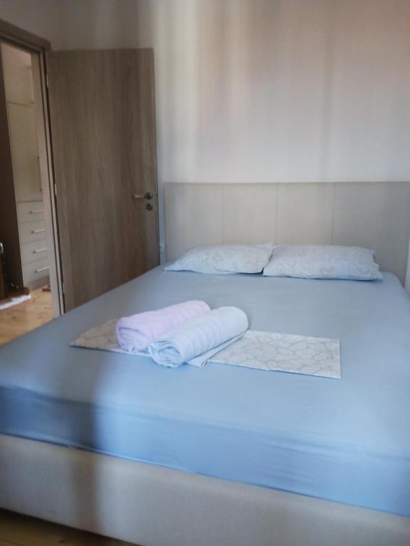 Postel nebo postele na pokoji v ubytování Vagia's Home