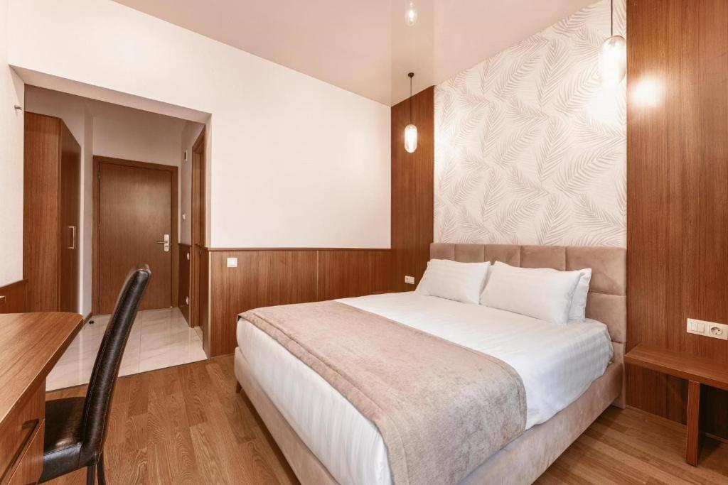 Postel nebo postele na pokoji v ubytování Park Hotel Tskaltubo - Balneo Resort