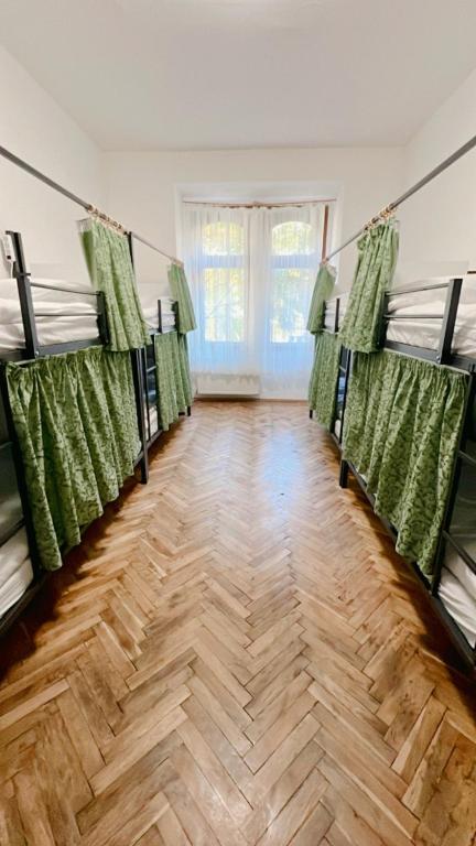 Postel nebo postele na pokoji v ubytování Hostel DO-RE-MI