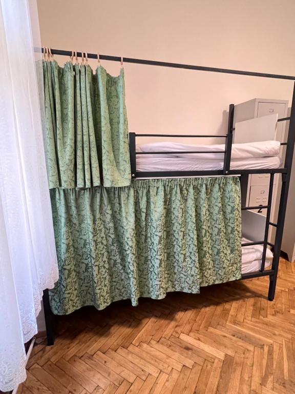 Postel nebo postele na pokoji v ubytování Hostel DO-RE-MI