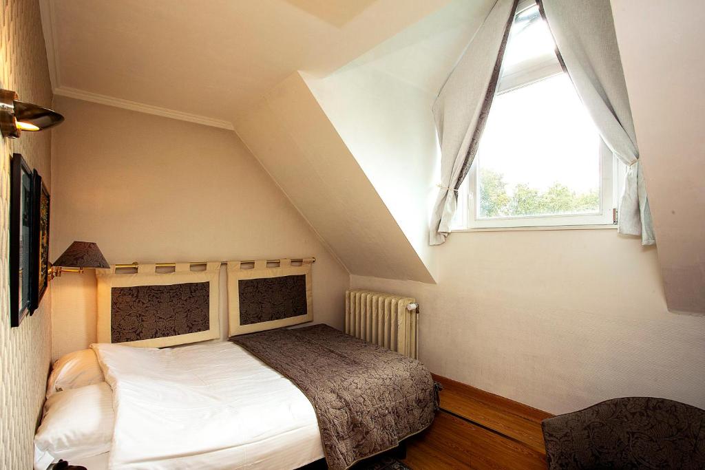 Postel nebo postele na pokoji v ubytování Boutique hotel Shamon