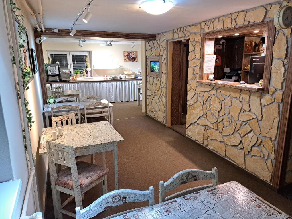 Kuchyň nebo kuchyňský kout v ubytování Alcorso Pension