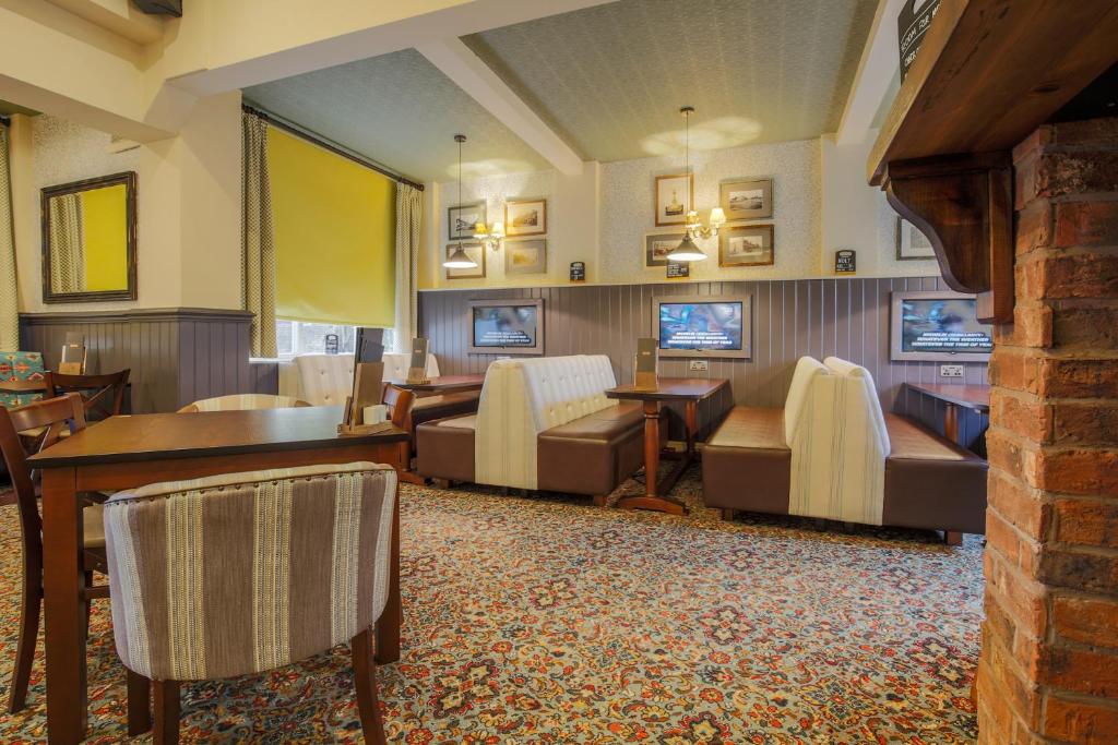 Posezení v ubytování Fairway Inn