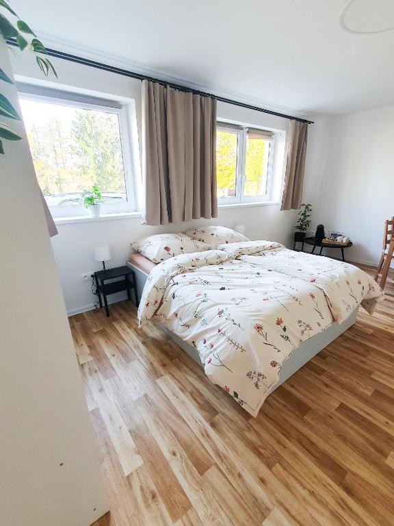 Postel nebo postele na pokoji v ubytování Apartmán U sklepů
