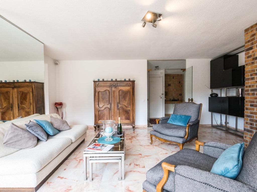 Televízia a/alebo spoločenská miestnosť v ubytovaní Grand appartement avec terrasse face au Mont-Blanc, parking et WiFi - FR-1-343-173
