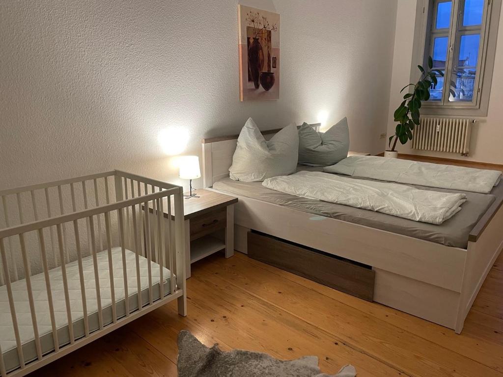 Postel nebo postele na pokoji v ubytování Brix Apartment