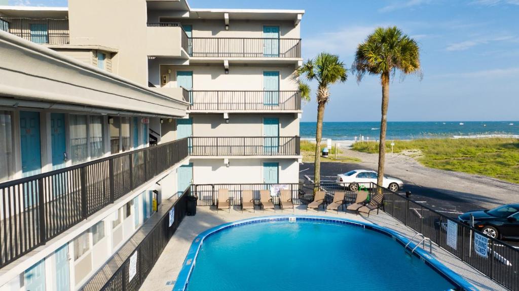 a balcony view of a hotel with a swimming pool at Aventura on the Ocean in Myrtle Beach