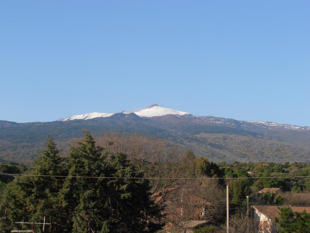 a view of a snow covered mountain in the distance at Chalet Don Bosco in Castiglione di Sicilia