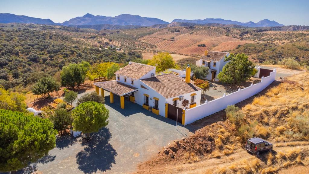 an aerial view of a house in the hills at Cubo's Cortijo El Perezon in Archidona