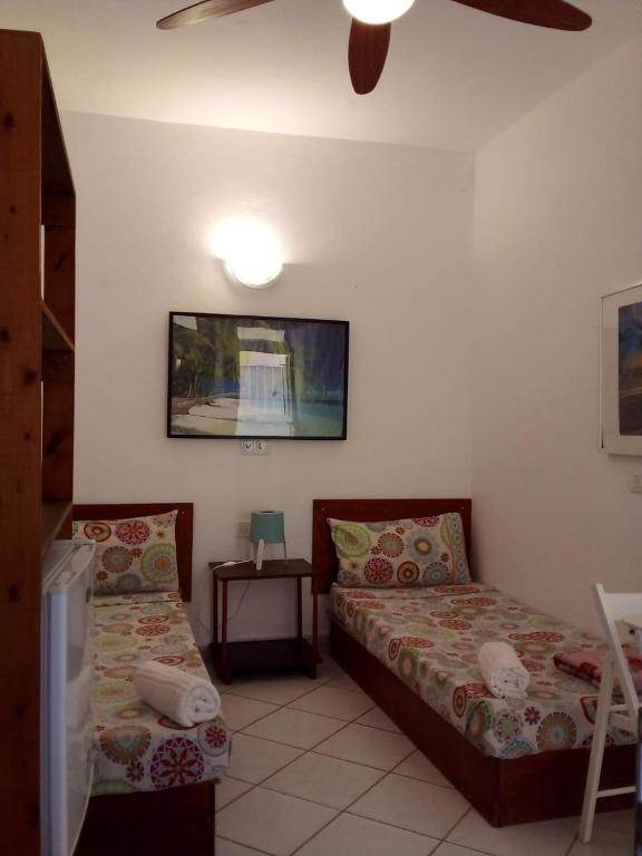 Postel nebo postele na pokoji v ubytování Hostels Holiday Cape Verde