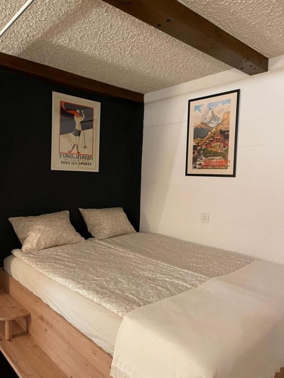 Postel nebo postele na pokoji v ubytování Grand studio à Ovronnaz