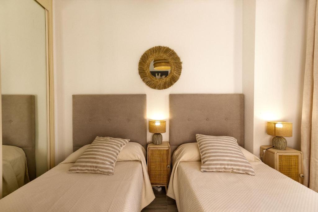 A bed or beds in a room at 2034 Hacienda Nagueles I Marbella Golden Mile