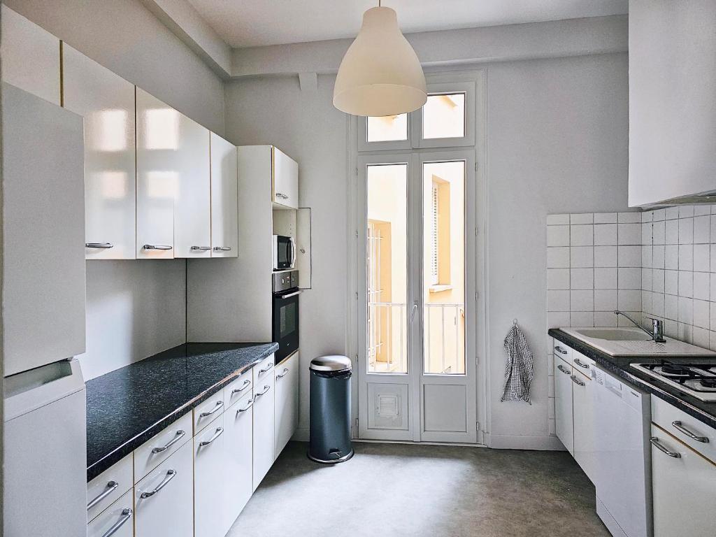 Kuchyň nebo kuchyňský kout v ubytování L'Idrac, Appartements en Hyper centre